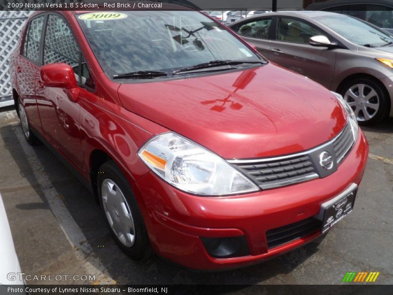 Red Brick / Charcoal 2009 Nissan Versa 1.8 S Sedan