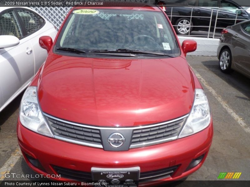 Red Brick / Charcoal 2009 Nissan Versa 1.8 S Sedan