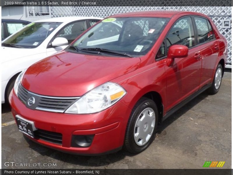 Red Brick / Charcoal 2009 Nissan Versa 1.8 S Sedan