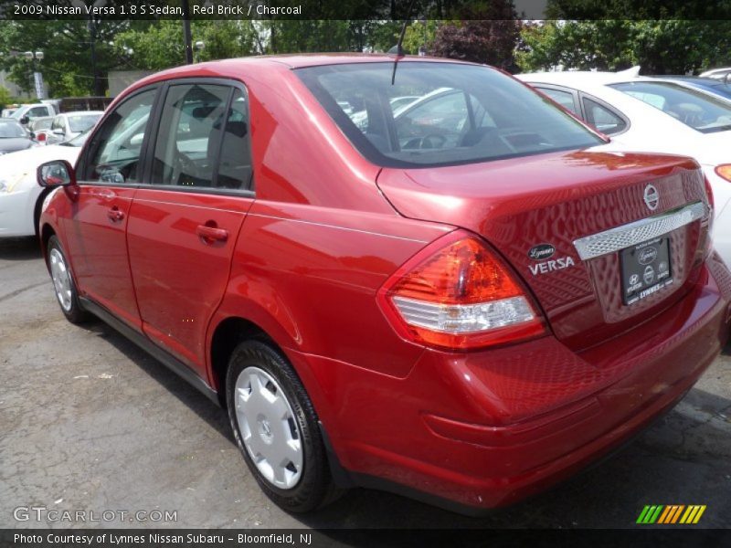 Red Brick / Charcoal 2009 Nissan Versa 1.8 S Sedan