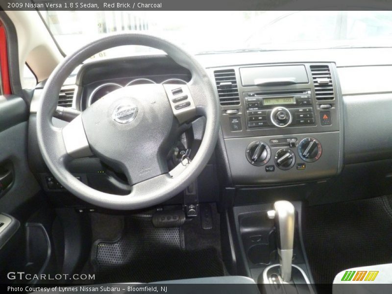 Red Brick / Charcoal 2009 Nissan Versa 1.8 S Sedan