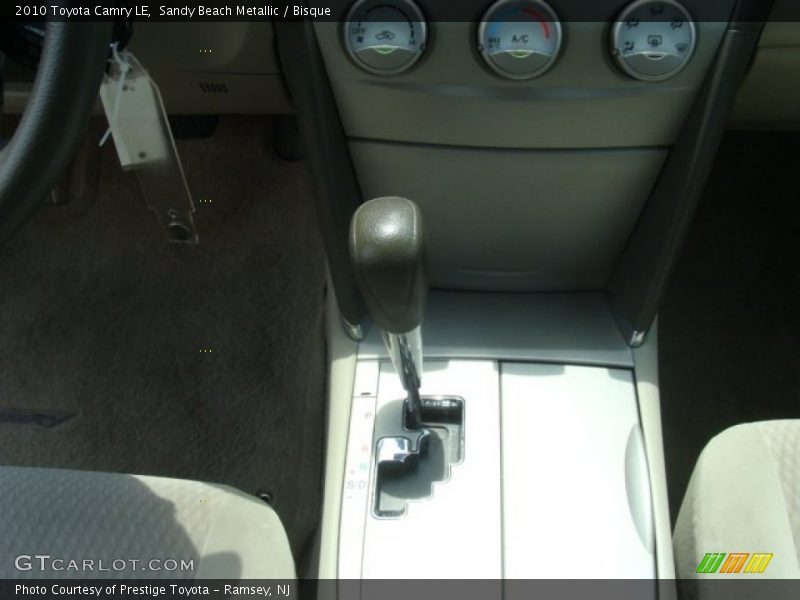 Sandy Beach Metallic / Bisque 2010 Toyota Camry LE