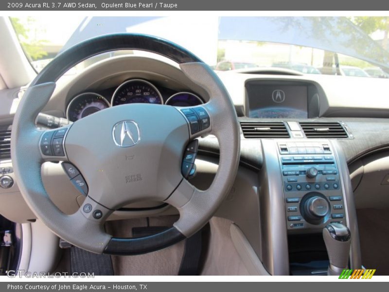 Opulent Blue Pearl / Taupe 2009 Acura RL 3.7 AWD Sedan
