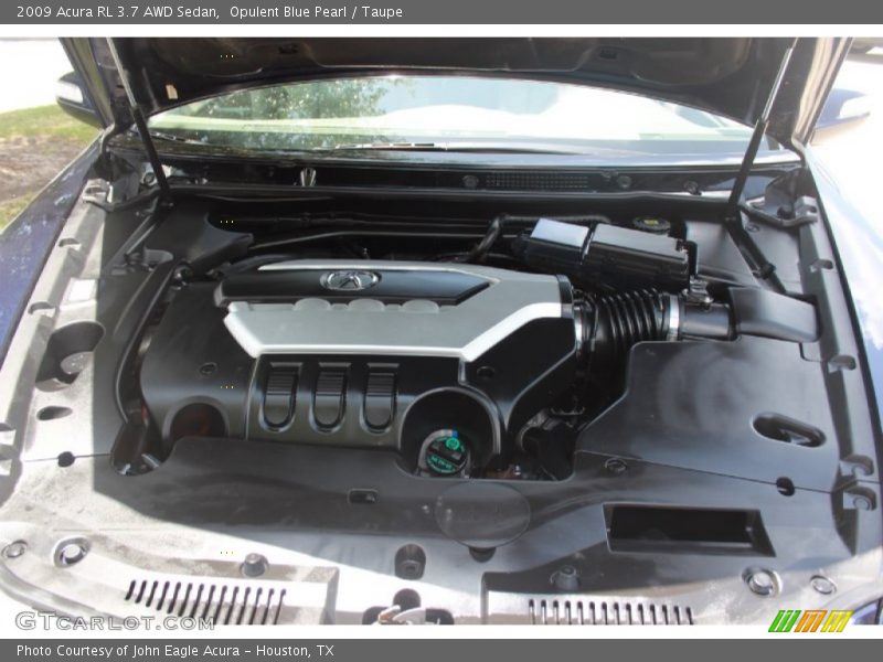 Opulent Blue Pearl / Taupe 2009 Acura RL 3.7 AWD Sedan
