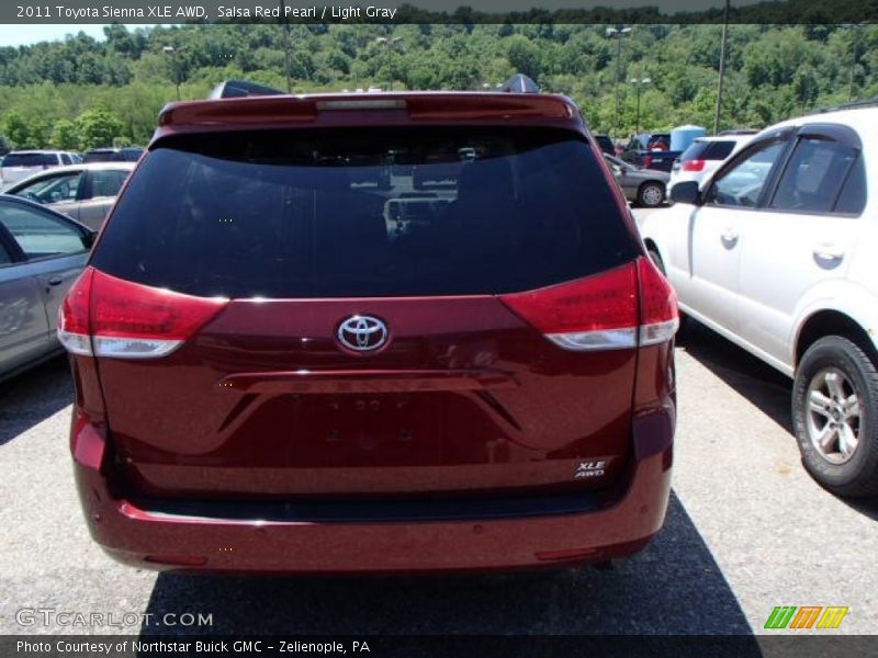 Salsa Red Pearl / Light Gray 2011 Toyota Sienna XLE AWD