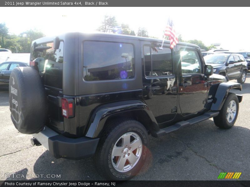 Black / Black 2011 Jeep Wrangler Unlimited Sahara 4x4