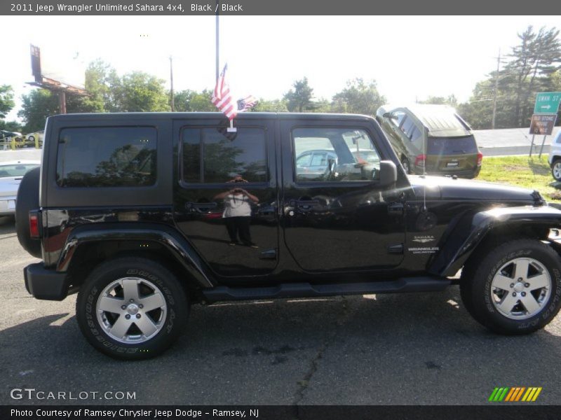 Black / Black 2011 Jeep Wrangler Unlimited Sahara 4x4