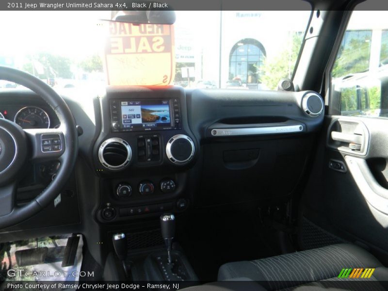 Black / Black 2011 Jeep Wrangler Unlimited Sahara 4x4