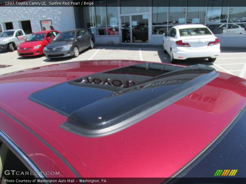 Sunfire Red Pearl / Beige 1997 Toyota Camry LE
