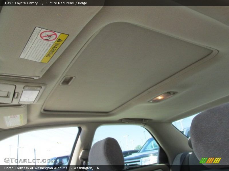 Sunfire Red Pearl / Beige 1997 Toyota Camry LE