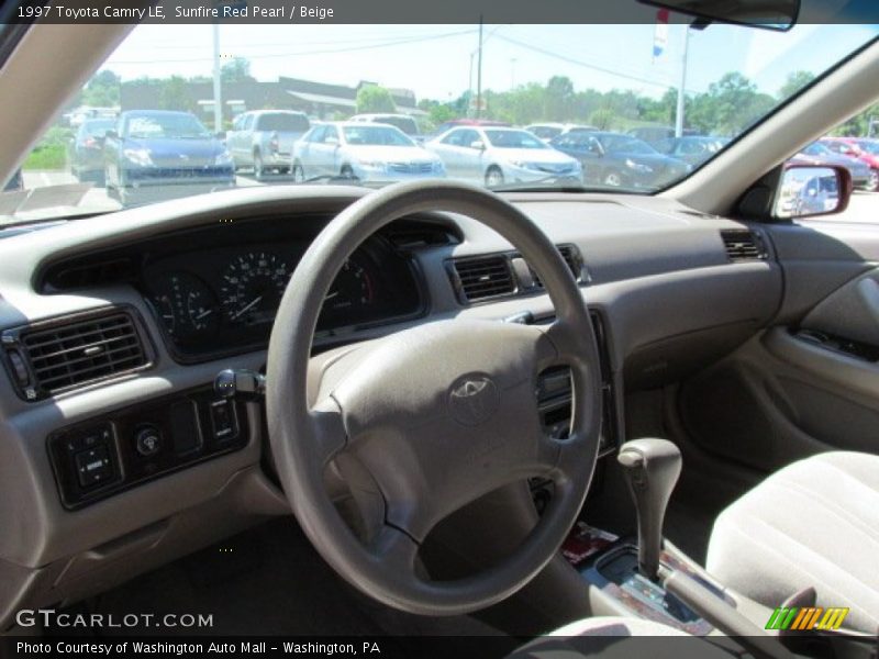 Sunfire Red Pearl / Beige 1997 Toyota Camry LE