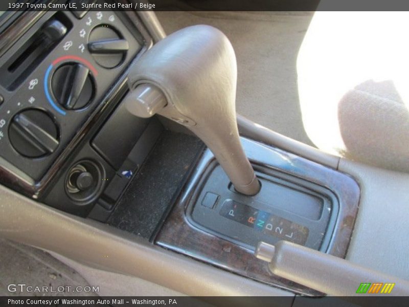 Sunfire Red Pearl / Beige 1997 Toyota Camry LE