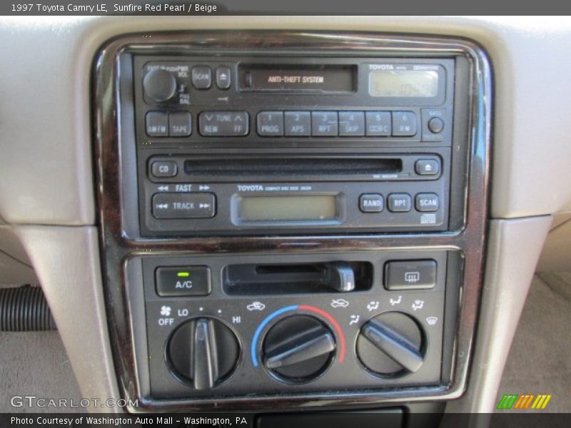 Sunfire Red Pearl / Beige 1997 Toyota Camry LE