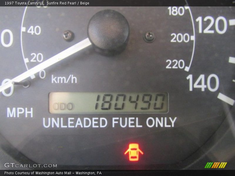 Sunfire Red Pearl / Beige 1997 Toyota Camry LE