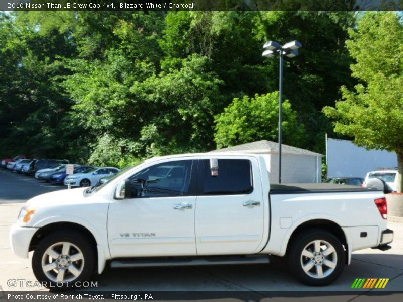 Blizzard White / Charcoal 2010 Nissan Titan LE Crew Cab 4x4