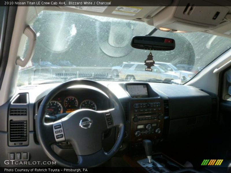 Blizzard White / Charcoal 2010 Nissan Titan LE Crew Cab 4x4