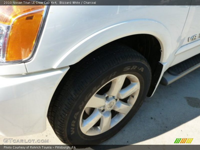 Blizzard White / Charcoal 2010 Nissan Titan LE Crew Cab 4x4