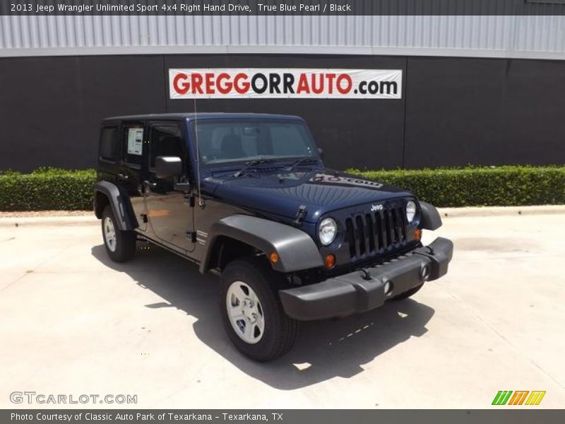 True Blue Pearl / Black 2013 Jeep Wrangler Unlimited Sport 4x4 Right Hand Drive