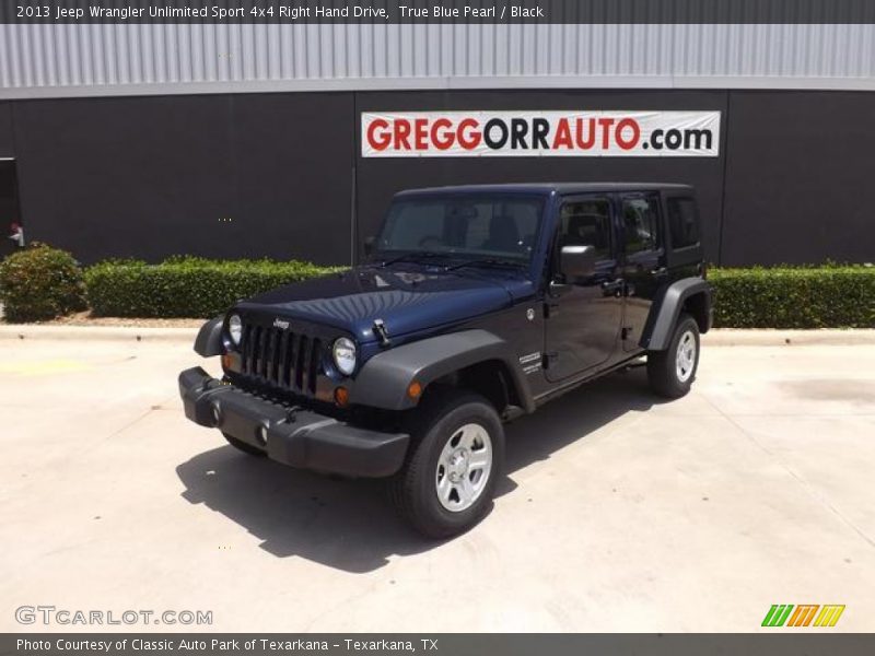 True Blue Pearl / Black 2013 Jeep Wrangler Unlimited Sport 4x4 Right Hand Drive