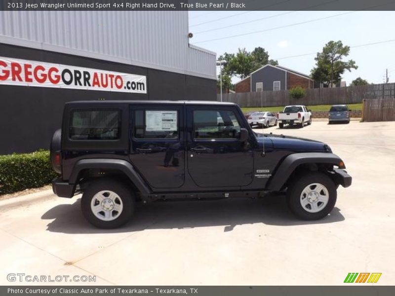 True Blue Pearl / Black 2013 Jeep Wrangler Unlimited Sport 4x4 Right Hand Drive