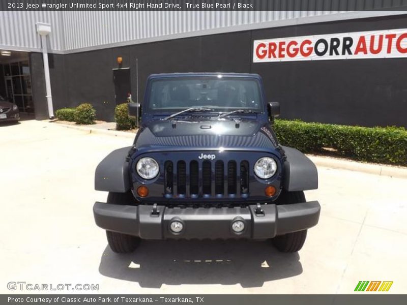 True Blue Pearl / Black 2013 Jeep Wrangler Unlimited Sport 4x4 Right Hand Drive