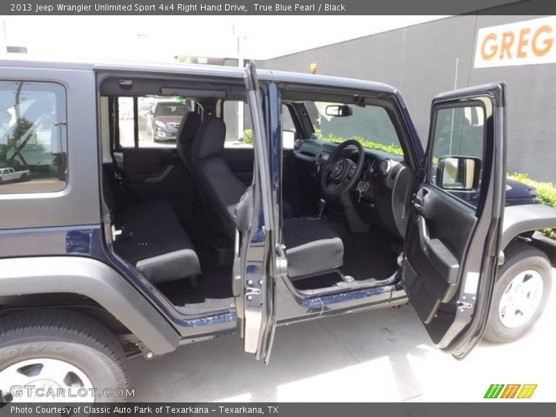 True Blue Pearl / Black 2013 Jeep Wrangler Unlimited Sport 4x4 Right Hand Drive