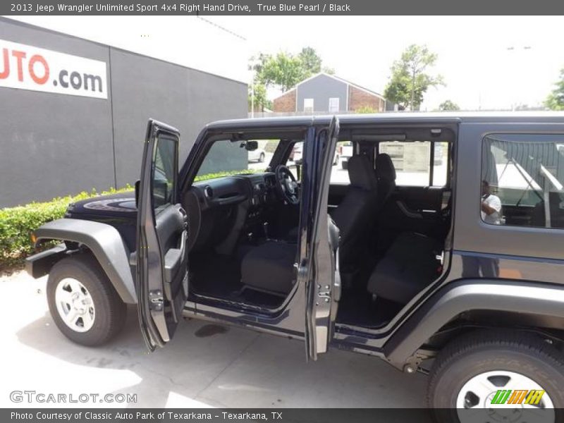 True Blue Pearl / Black 2013 Jeep Wrangler Unlimited Sport 4x4 Right Hand Drive