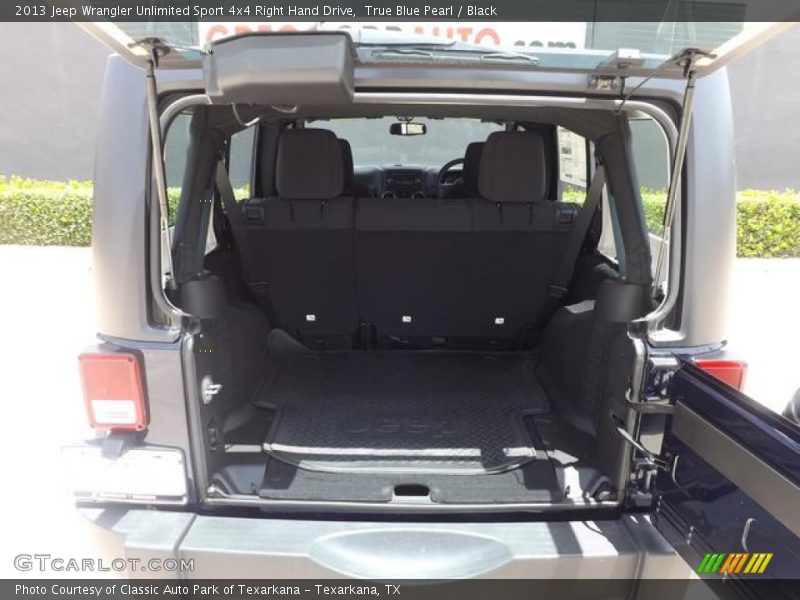 True Blue Pearl / Black 2013 Jeep Wrangler Unlimited Sport 4x4 Right Hand Drive