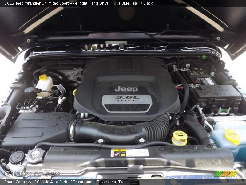 True Blue Pearl / Black 2013 Jeep Wrangler Unlimited Sport 4x4 Right Hand Drive