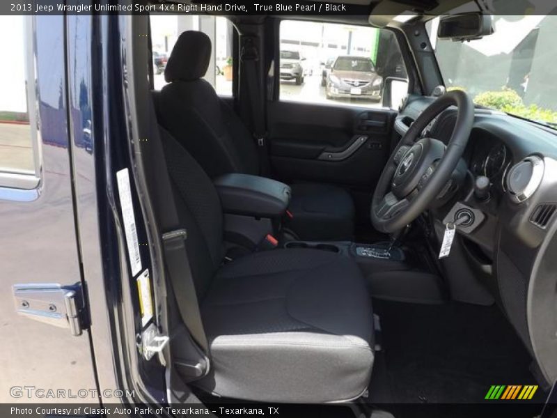 True Blue Pearl / Black 2013 Jeep Wrangler Unlimited Sport 4x4 Right Hand Drive