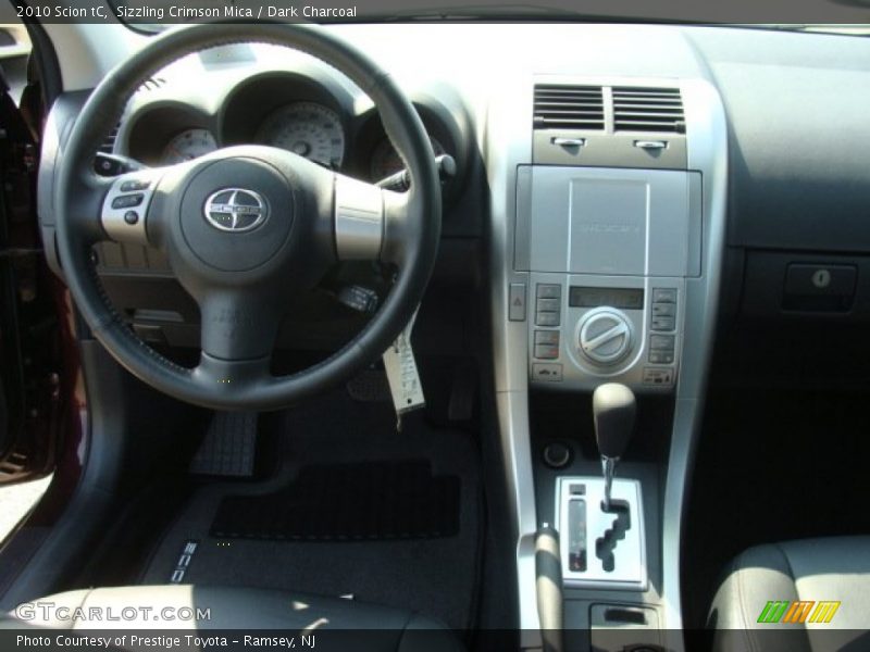 Sizzling Crimson Mica / Dark Charcoal 2010 Scion tC