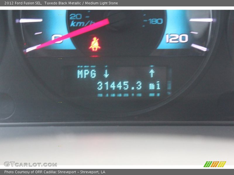Tuxedo Black Metallic / Medium Light Stone 2012 Ford Fusion SEL