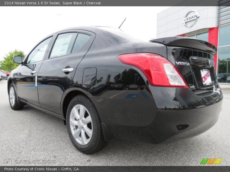 Super Black / Charcoal 2014 Nissan Versa 1.6 SV Sedan