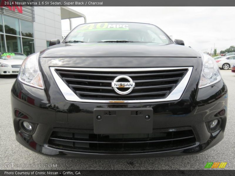 Super Black / Charcoal 2014 Nissan Versa 1.6 SV Sedan