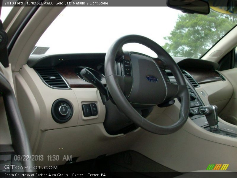 Gold Leaf Metallic / Light Stone 2010 Ford Taurus SEL AWD
