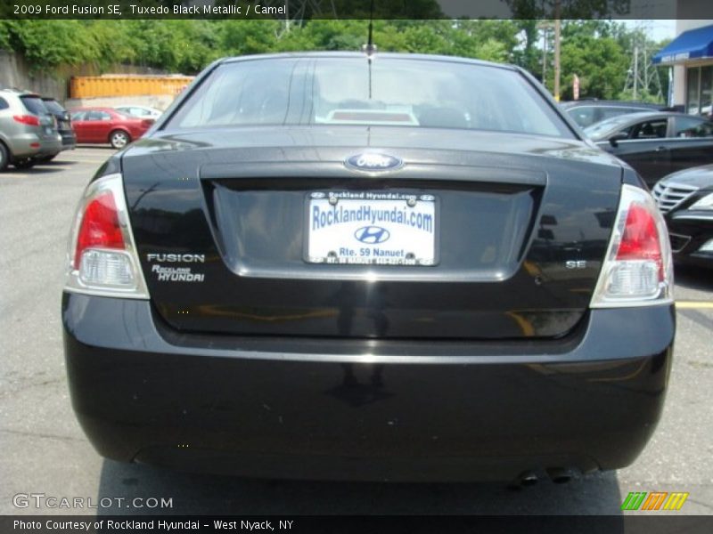 Tuxedo Black Metallic / Camel 2009 Ford Fusion SE