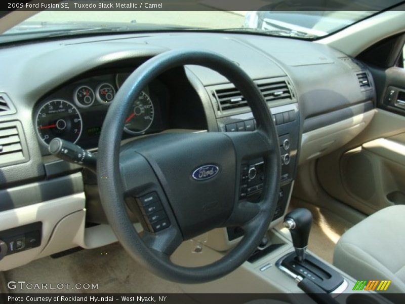Tuxedo Black Metallic / Camel 2009 Ford Fusion SE