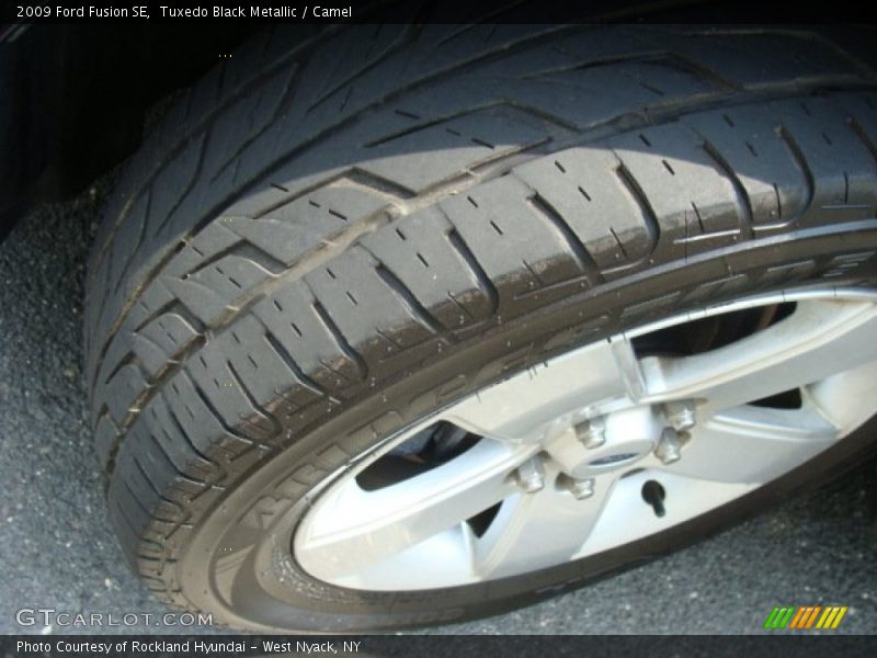Tuxedo Black Metallic / Camel 2009 Ford Fusion SE