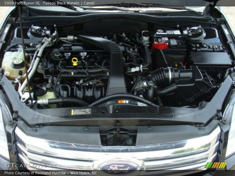 Tuxedo Black Metallic / Camel 2009 Ford Fusion SE