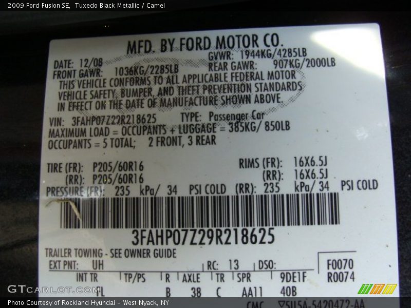 Tuxedo Black Metallic / Camel 2009 Ford Fusion SE