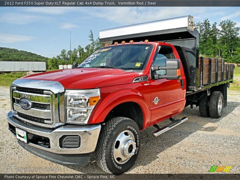 Front 3/4 View of 2012 F350 Super Duty XLT Regular Cab 4x4 Dump Truck
