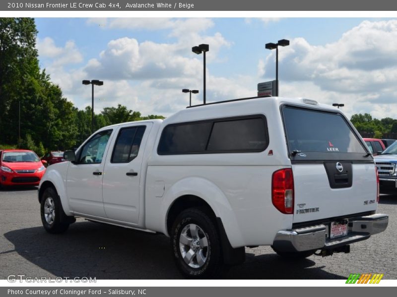 Avalanche White / Beige 2010 Nissan Frontier LE Crew Cab 4x4