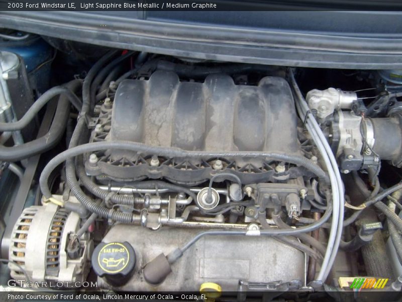 Light Sapphire Blue Metallic / Medium Graphite 2003 Ford Windstar LE