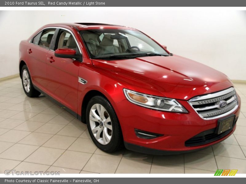 Red Candy Metallic / Light Stone 2010 Ford Taurus SEL