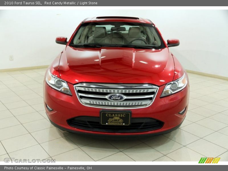 Red Candy Metallic / Light Stone 2010 Ford Taurus SEL