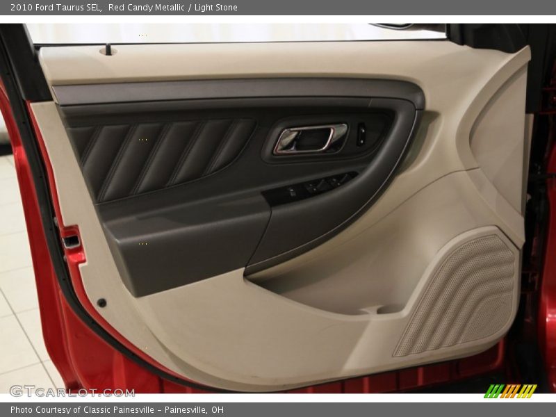 Red Candy Metallic / Light Stone 2010 Ford Taurus SEL