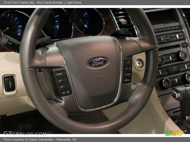Red Candy Metallic / Light Stone 2010 Ford Taurus SEL