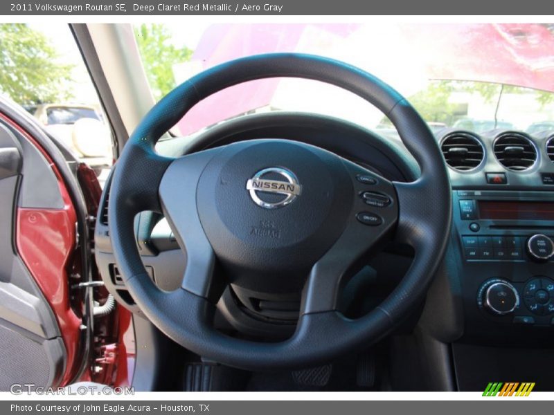Deep Claret Red Metallic / Aero Gray 2011 Volkswagen Routan SE