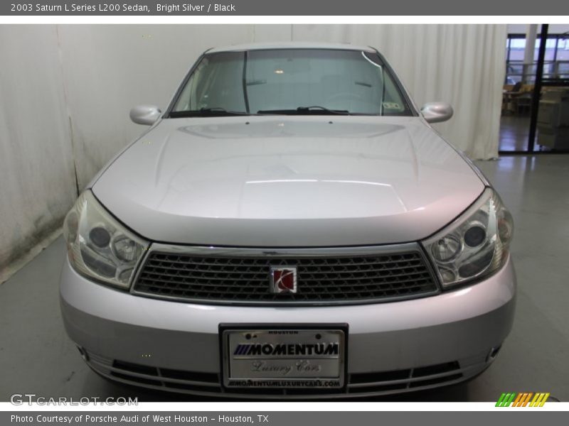 Bright Silver / Black 2003 Saturn L Series L200 Sedan