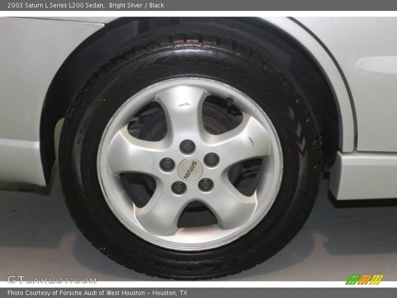 Bright Silver / Black 2003 Saturn L Series L200 Sedan